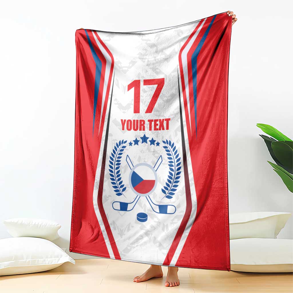 Red and white hockey blanket with blue flag emblem, number 17, and 'YOUR TEXT' centered.