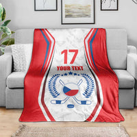 Red, white, and blue hockey blanket showing number 17, 'YOUR TEXT', and flag emblem.
