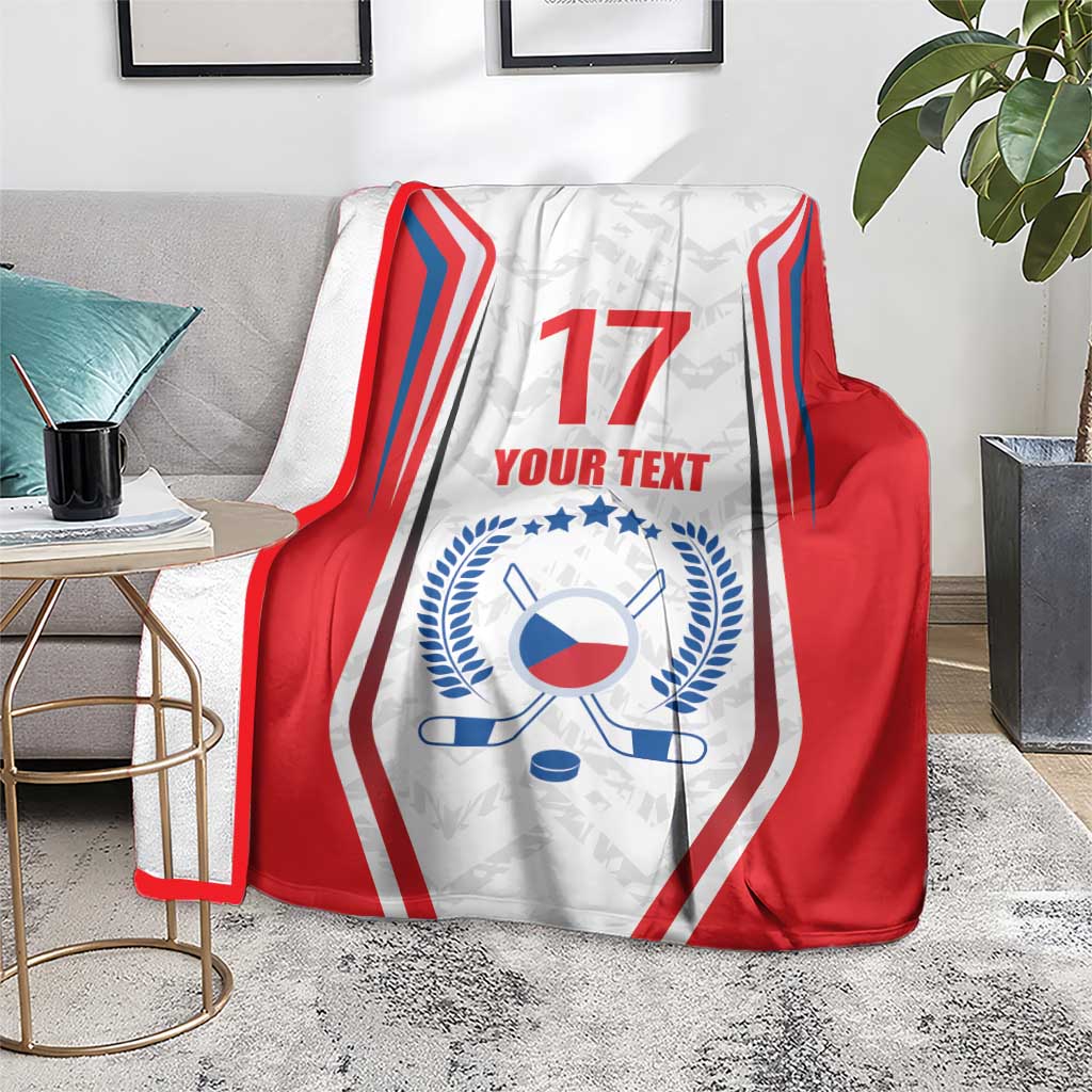 Red and white hockey-style blanket with number 17, 'YOUR TEXT', and blue flag emblem.