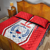 Red quilt bed set with white Czech ice hockey crest and black-trimmed pillow
