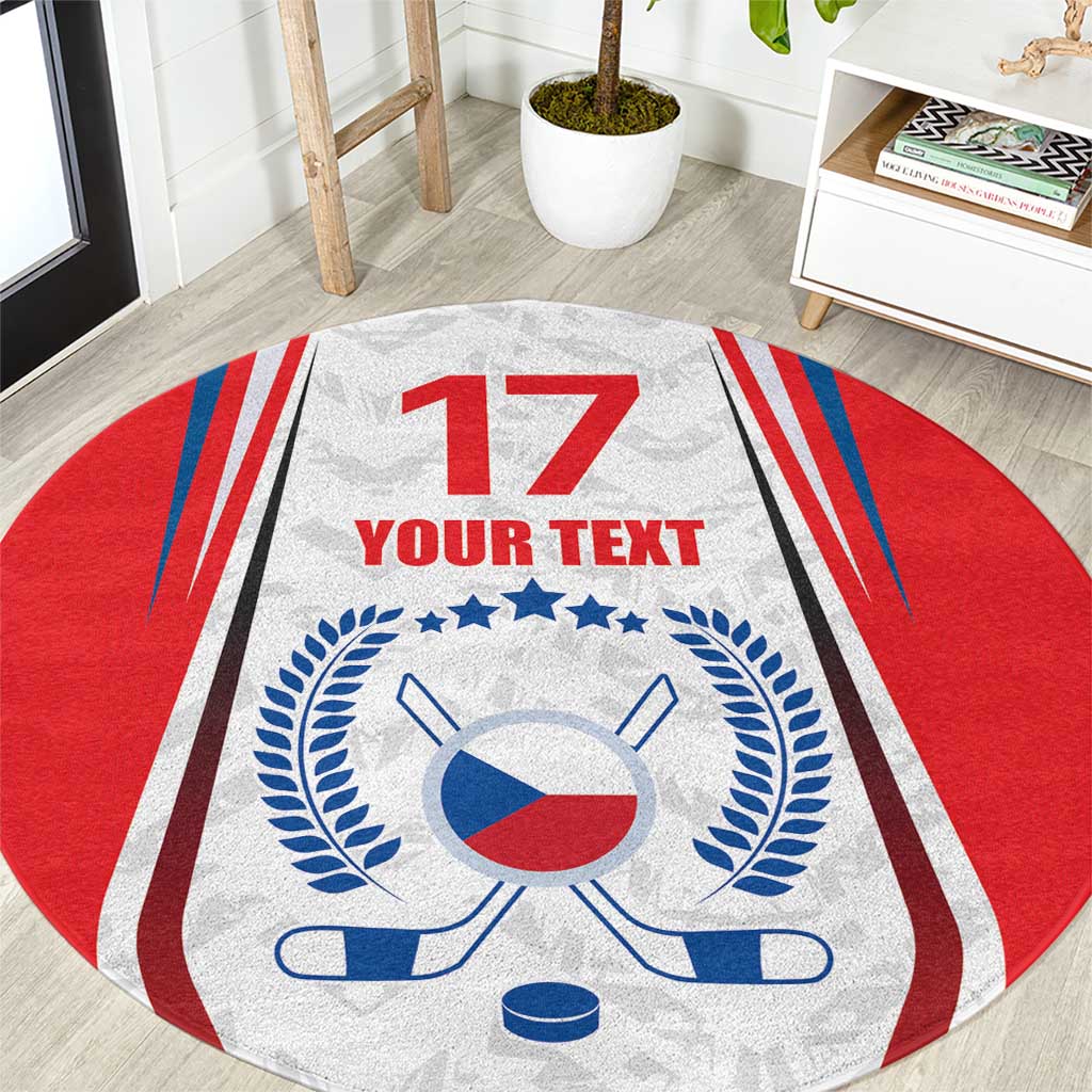 Round hockey-themed area rug with red, white, and blue crest, sticks, puck, and '17'