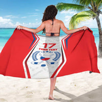 Red and white sarong with Czech hockey emblem and number 17, held as flag