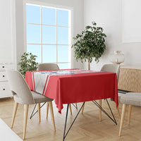 Red Czech ice hockey tablecloth with white panels and blue crest, draped over table