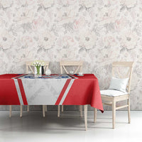 Red Czech ice hockey tablecloth with blue-and-white crest laid on a dining table