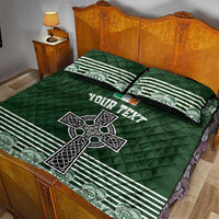 Green quilt bed set with Celtic cross and shamrock graphic, quilted pattern, striped edges