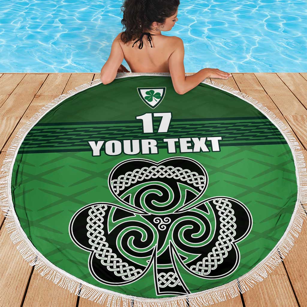 Green round beach blanket with white fringe, Celtic knot shamrock design and “YOUR TEXT”