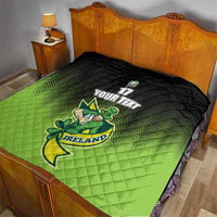Green and black quilt blanket on bed with Ireland shamrock mascot and custom text