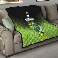 Green and black quilt blanket on sofa with Ireland shamrock mascot and custom text