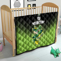 Green and black quilt blanket in toddler bed with Ireland shamrock mascot and custom text