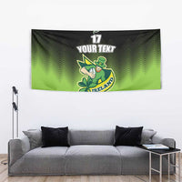 Green and black rugby tapestry, zigzag pattern, leprechaun mascot holding clover, '17' 'YOUR TEXT' 'IRELAND'.
