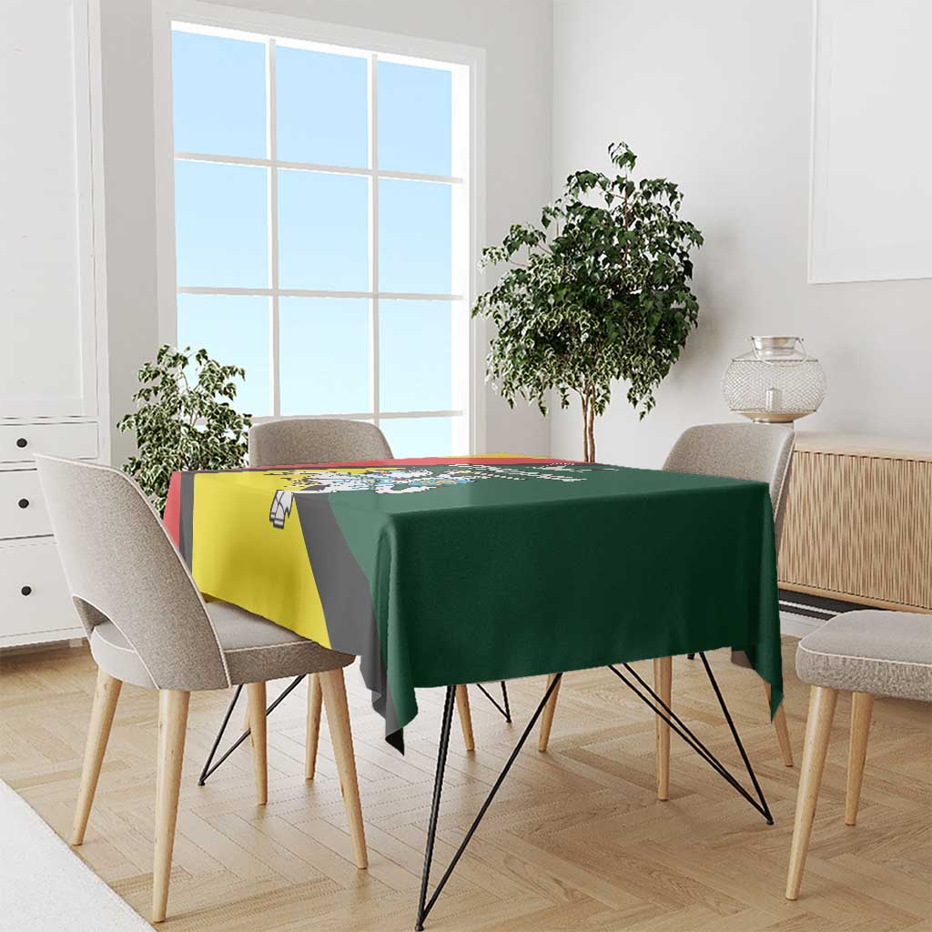 Lithuanian crest tablecloth draped on dining table with flag-style Vytis and eagle design