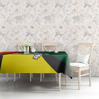 Lithuanian crest tablecloth on dining set with eagle-and-Vytis motif in yellow and green