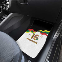 White car floor mat with February text, skyline silhouettes, and colorful flag graphic