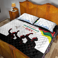 White quilt bed set with black lower half; Independence Day text, soldiers and flag map