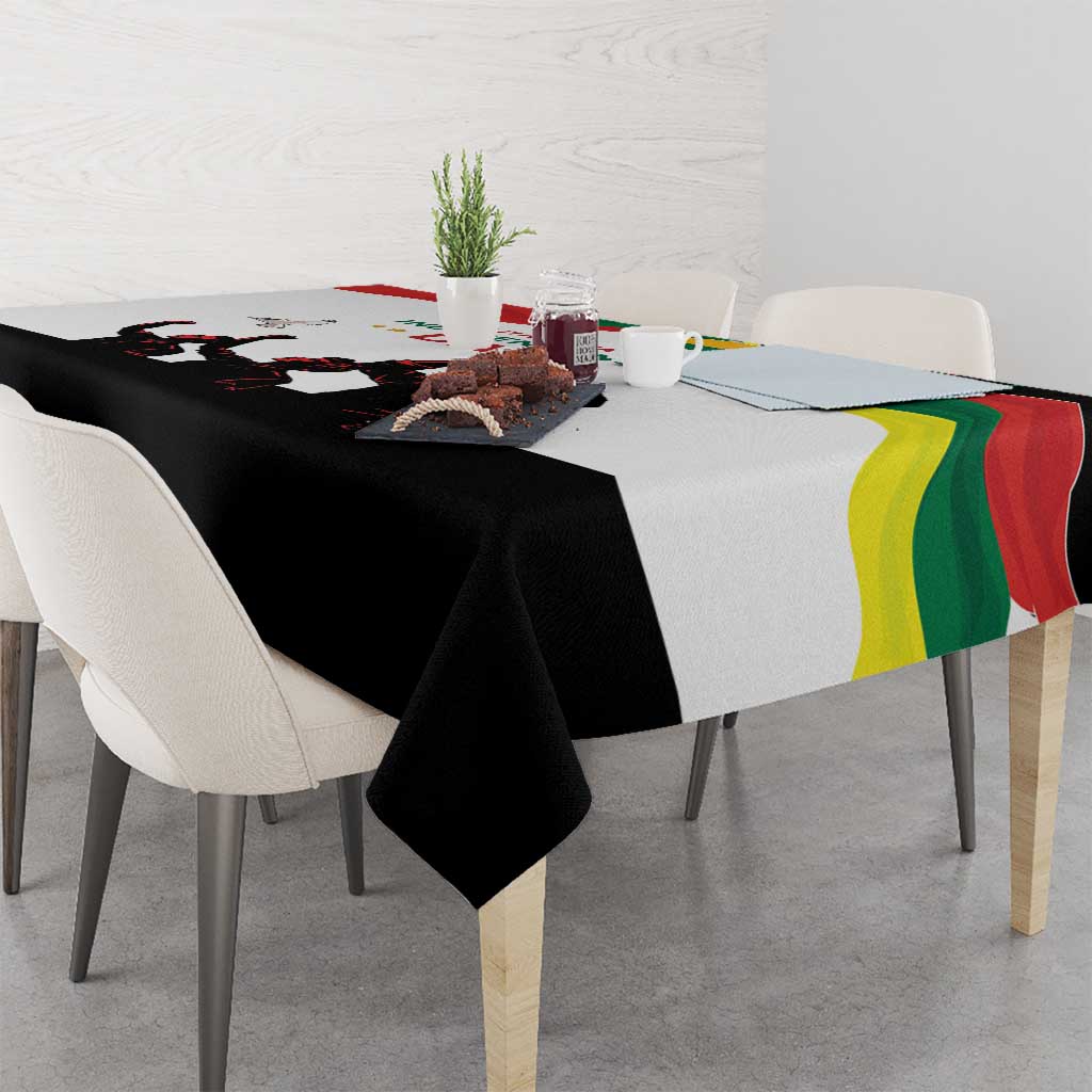 Independence Day tablecloth draped on dining table, with Lithuania lettering and silhouettes