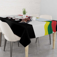 Independence Day tablecloth draped on dining table, with Lithuania lettering and silhouettes
