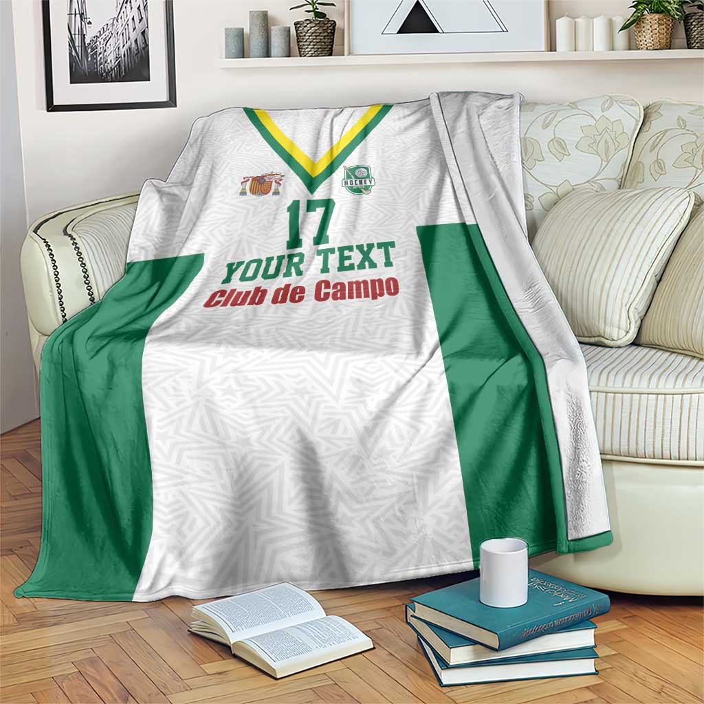 Custom field hockey blanket with white and green jersey design, V trim, number 17, logos.