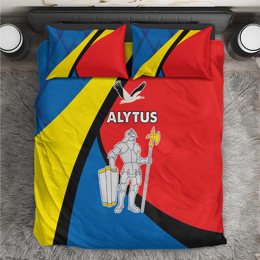 Overhead view of blue, yellow and red Alytus crest bedding set with two pillowcases