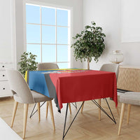 Blue and red Kaunas coat of arms tablecloth draped over dining table