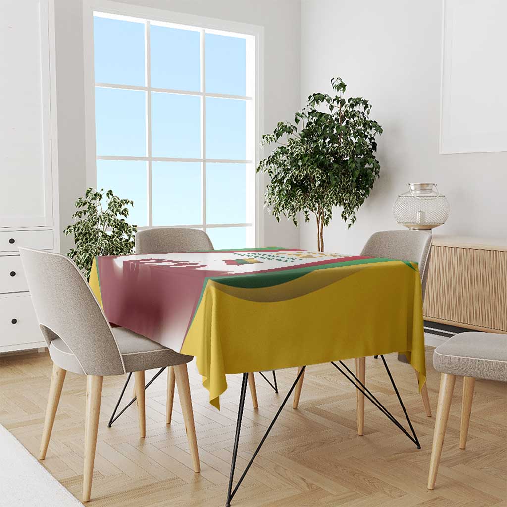 Independence Day tablecloth with burgundy, green, yellow panel print draped over table