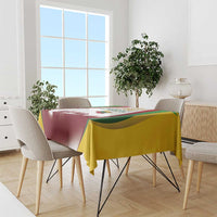 Independence Day tablecloth with burgundy, green, yellow panel print draped over table