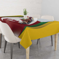 Independence Day tablecloth with draped burgundy base and green yellow flag-style edge
