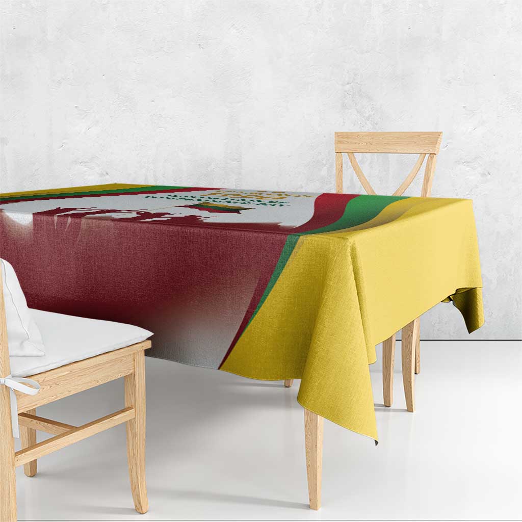 Independence Day tablecloth draped on bench with burgundy print center and yellow border