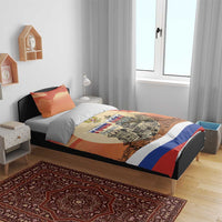 Personalized red duvet on bed with two pillows, Russia city design and blue-white stripe