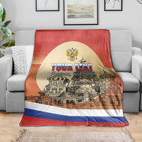 Personalized Russia Day blanket draped over sofa, circular crest, “YOUR TEXT”, city illustration