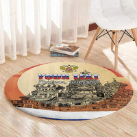 Round carpet with red edge, beige center, city artwork with 'YOUR TEXT' banner