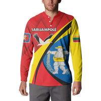 Red long-sleeve button sweatshirt with bold front crest graphic, worn by man.