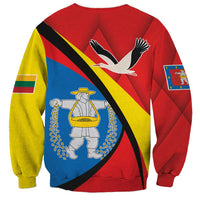 Red unisex sweatshirt with bird graphic and diagonal stripe design on back