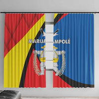 Window curtains with red, yellow, black, and blue graphic print panels