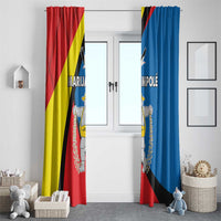 Pair of window curtains in red and blue with crest graphic and diagonal stripe design