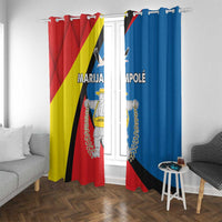 Window curtains mounted on a rod, red and blue panels with crest and text