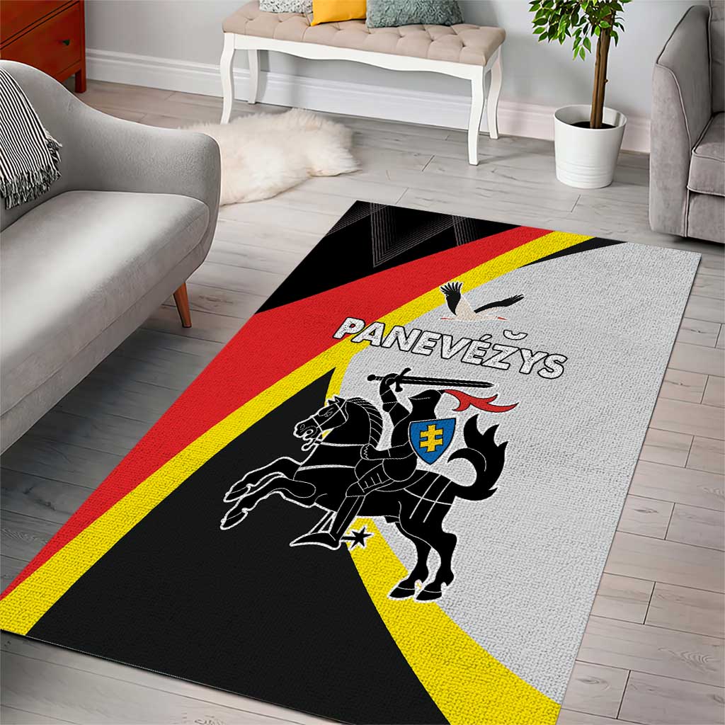 Black area rug with red and yellow diagonal stripes, lion crest and text