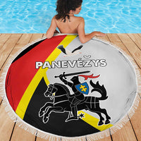 Round beach blanket with fringed edge, white with red/yellow/black knight-and-horse design