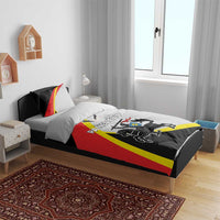 Black bedding set with red and yellow flag print on duvet and two pillows