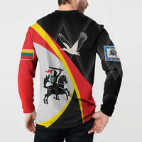 Black sweatshirt with diagonal flag stripe, bird motif, and right-sleeve crest patch