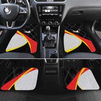 Black car floor mats with red-yellow diagonal stripe and white emblem graphics