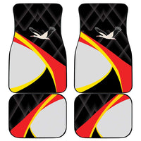 Set of black car floor mats with red-yellow stripe and white bird emblem design