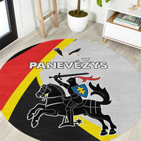 Round area rug with gray center and red, yellow, and black country-style crest graphic