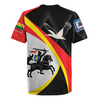 Black rugby jersey back view with red and yellow diagonal stripe, bird and knight crest graphic
