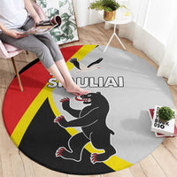 Round rug with SIAULIAI wolf and bird graphic, red yellow black flag-style design