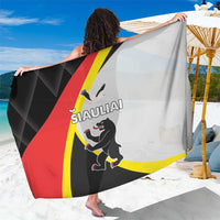 Black sarong with red-yellow crest graphic and white panel, large draped design
