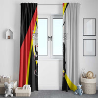 Pair of curtains in black and light gray with red-yellow flag design and cat graphic