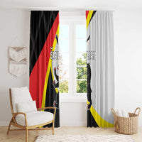 Black and white window curtain panels with flag print and cat silhouettes, hanging