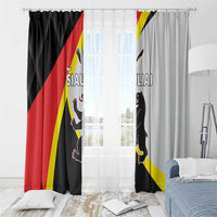 Black and light gray window curtains with red-yellow flag print and cat graphic