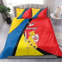 Full-size bedding set: red, yellow, and blue with “TAURAGE” crest pillow covers
