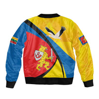 Yellow bomber jacket back with large lion-and-bird emblem and black diagonal stripe
